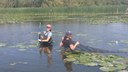 Dr. Balshine and Kirsten setting up a fyke net in Cootes Paradise.